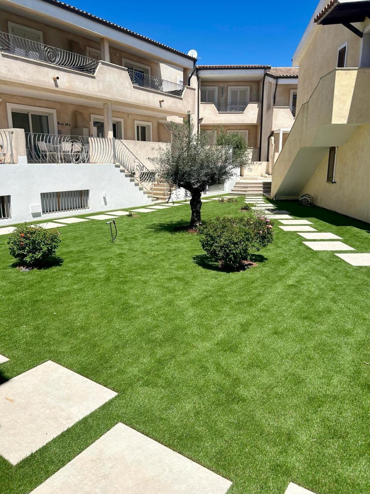 Appartamento Incantevole Con Piscina Palau Bagian luar foto